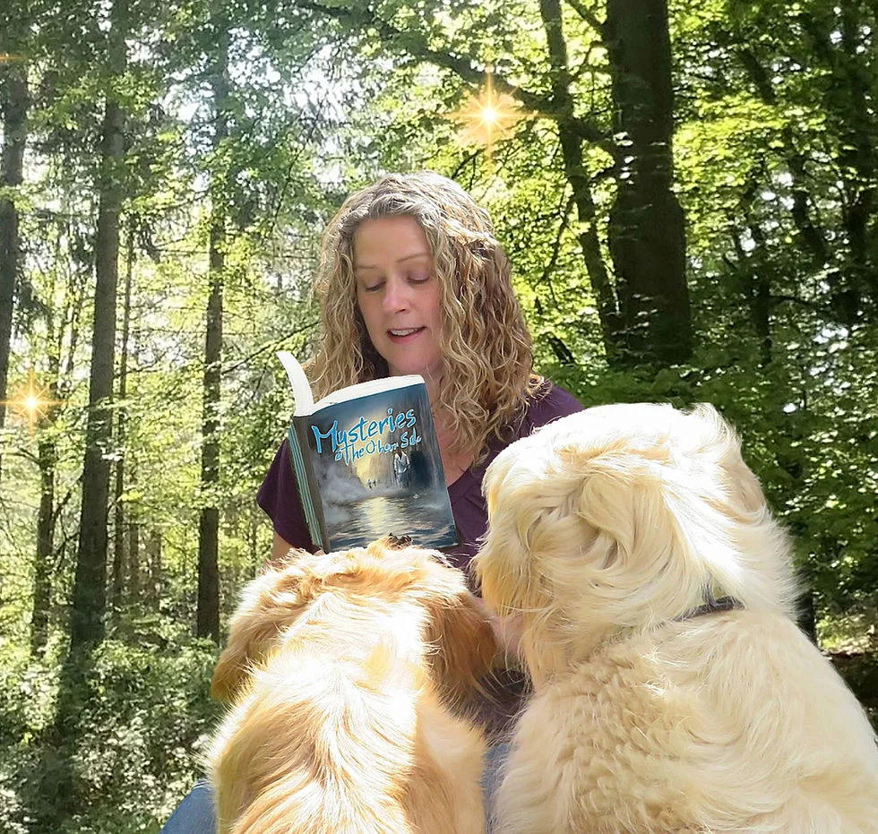 Woman reading "Mysteries of the Other Side" to two dogs in a sunlit forest. Warm, peaceful atmosphere with light filtering through trees.